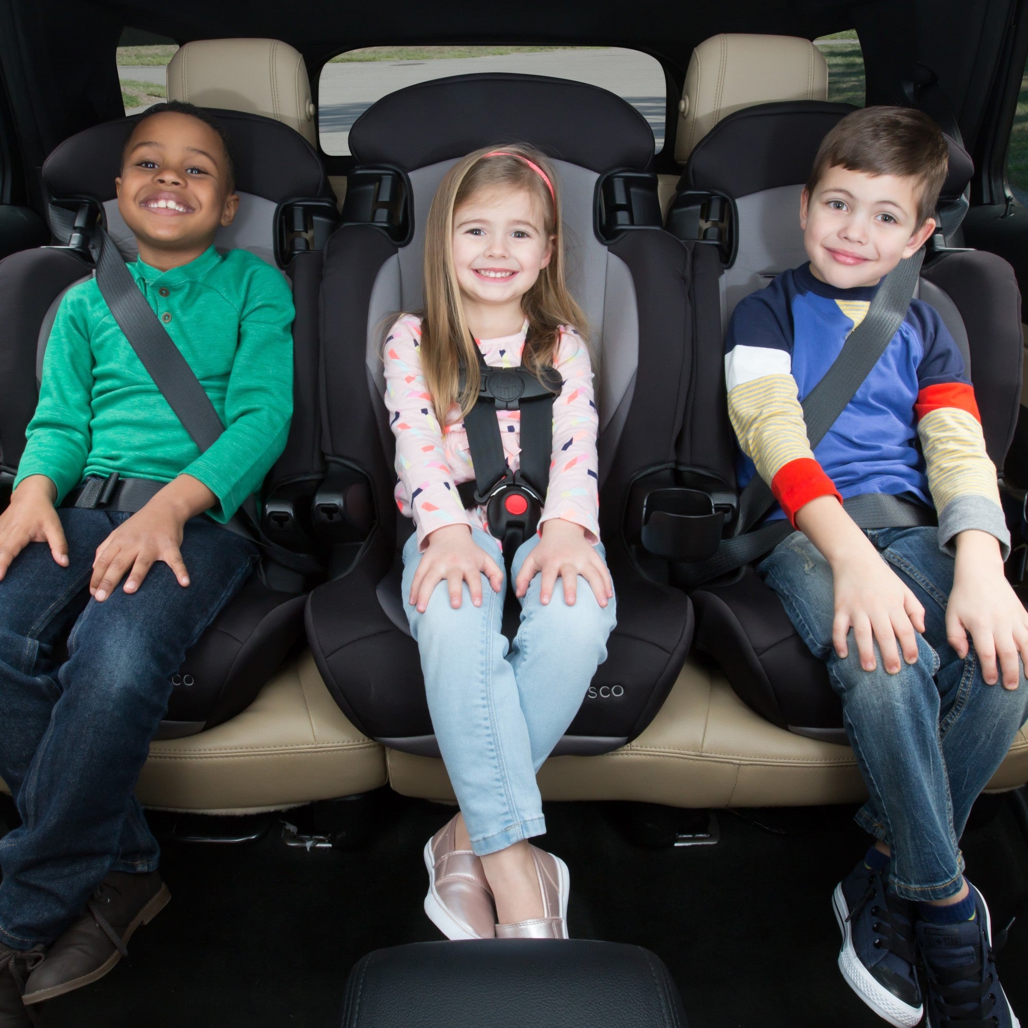 Cosco Kids™ Finale DX 2-in-1 Booster Car Seat - three children in three car seats