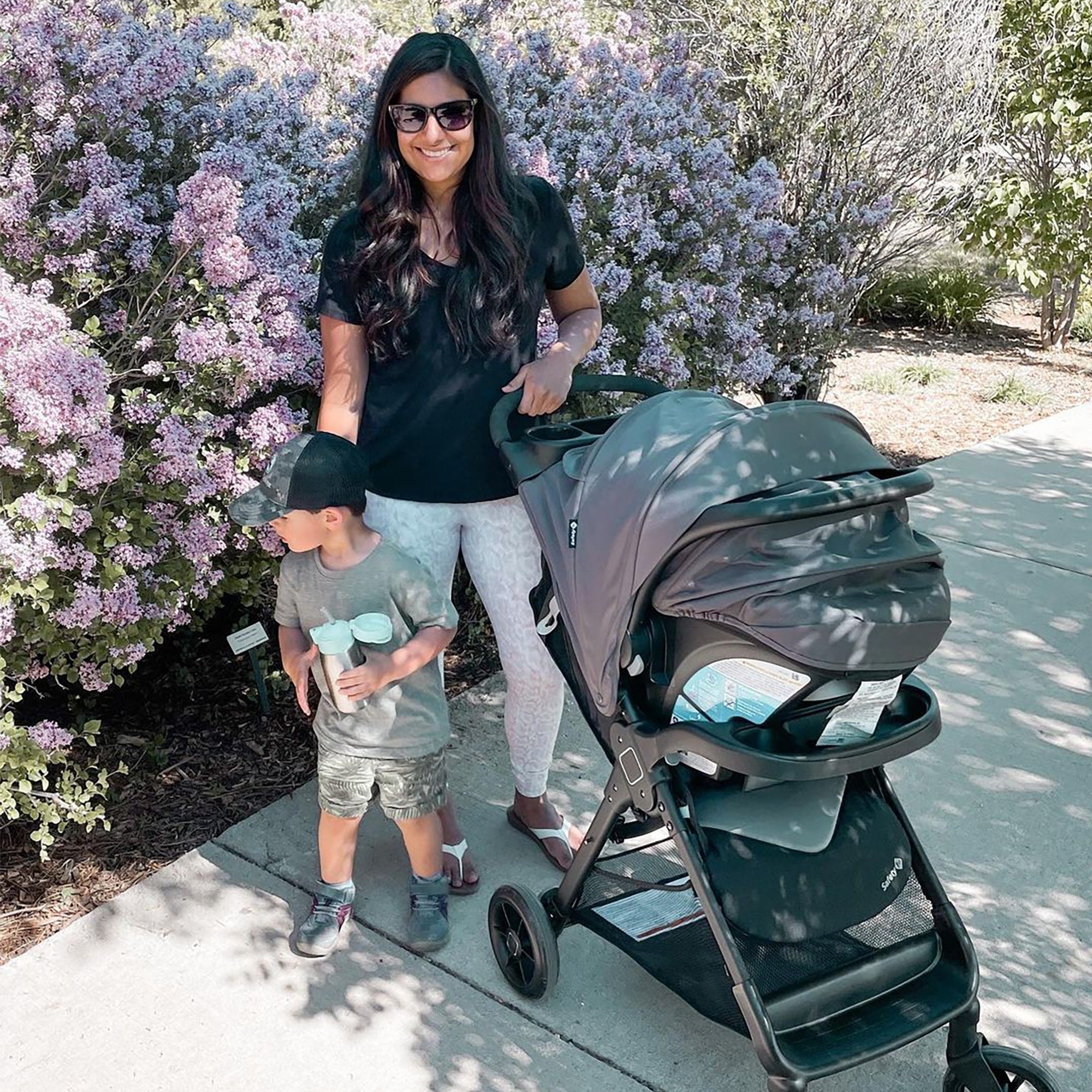 Mom with Son Outside with Smooth Ride Travel System