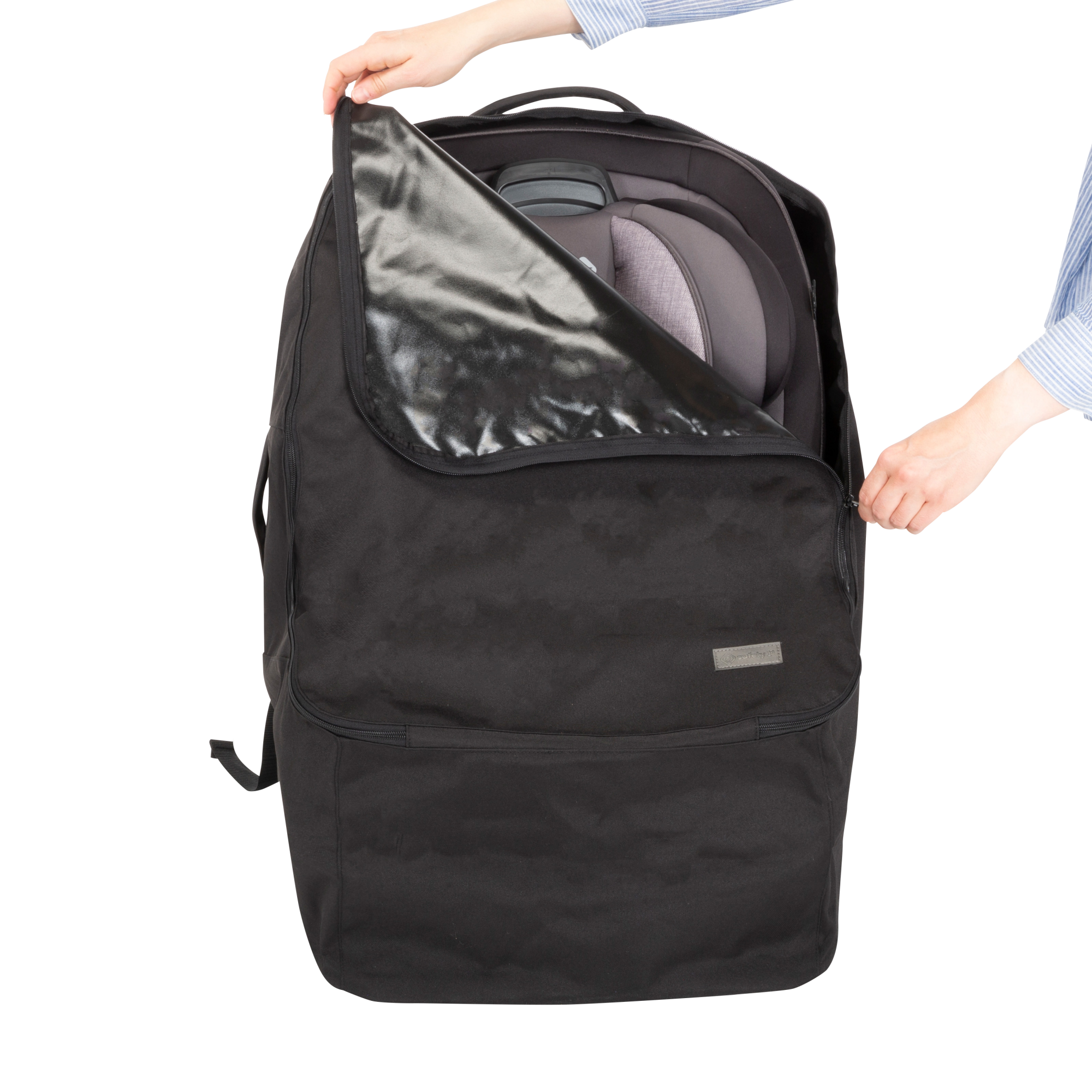 Travel Everywhere Car Seat Carry Bag - woman opening bag revealing car seat inside