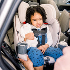 Emme 360™ Rotating All-in-One Convertible Car Seat - daughter snuggling with stuffed animal in front-facing mode