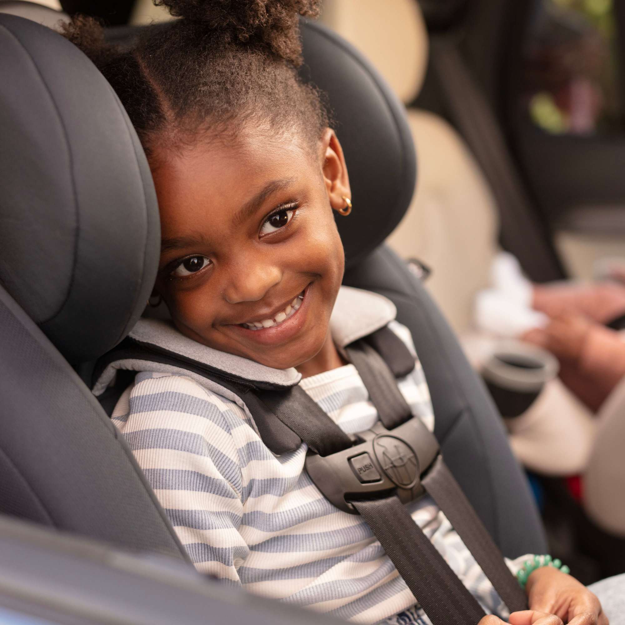 Magellan® LiftFit All-in-One Convertible Car Seat - boy in car seat smiling