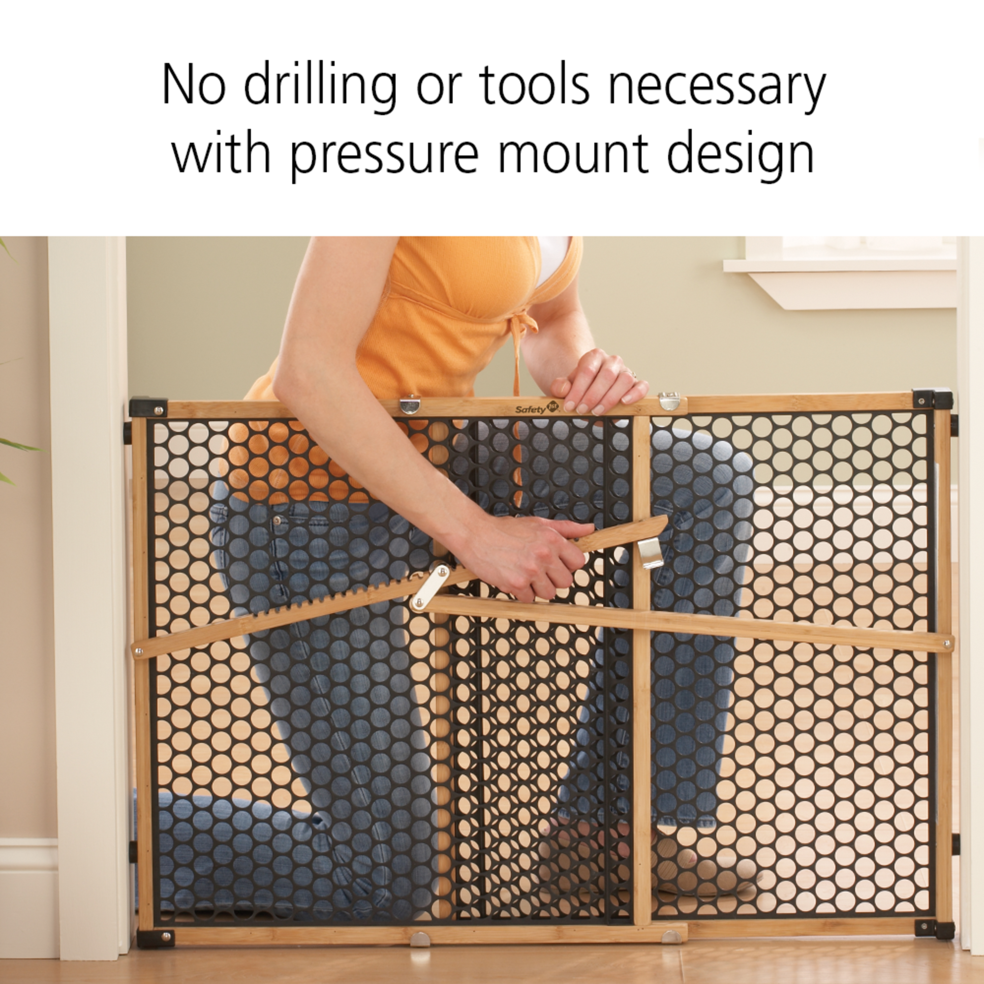 Baby gate with no drilling or tools necessary with pressure mount design.