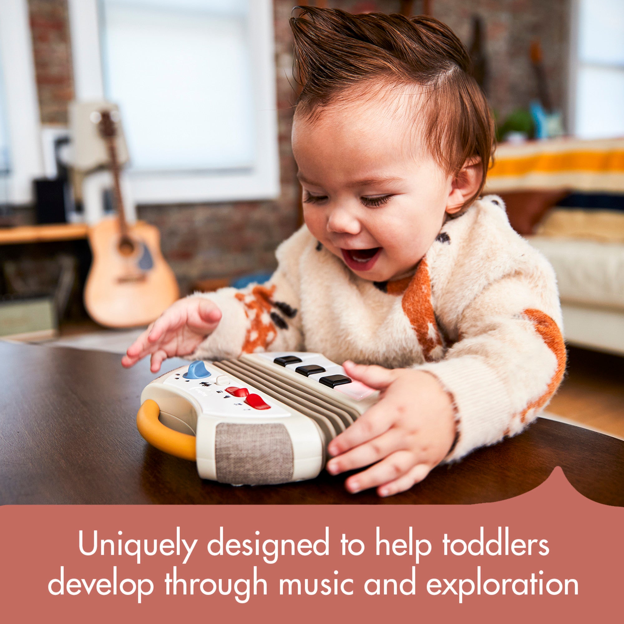 Tiny Rockers Accordion - Rewarding light-up piano keys help develop eye-hand coordination and support cognitive development