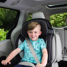 Grand 2-in-1 Booster Car Seat - boy smiling in booster seat