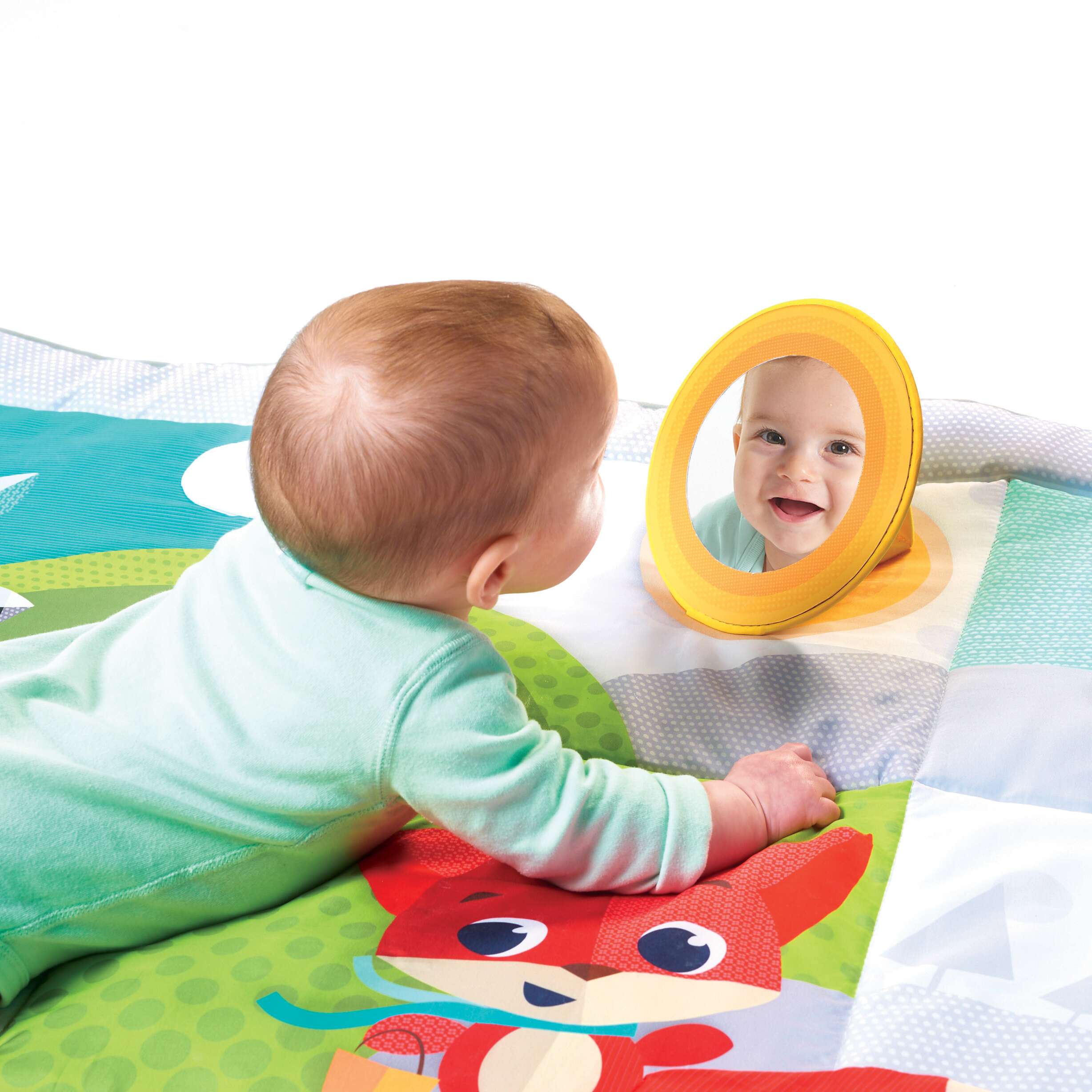 Tiny Love Meadow Days™ Super Mat - baby looking at himself in mirror