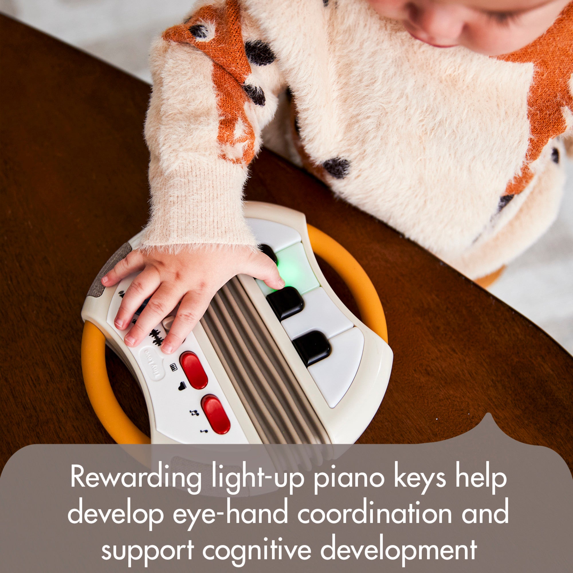 Tiny Rockers Accordion - Rewarding light-up piano keys help develop eye-hand coordination and support cognitive development
