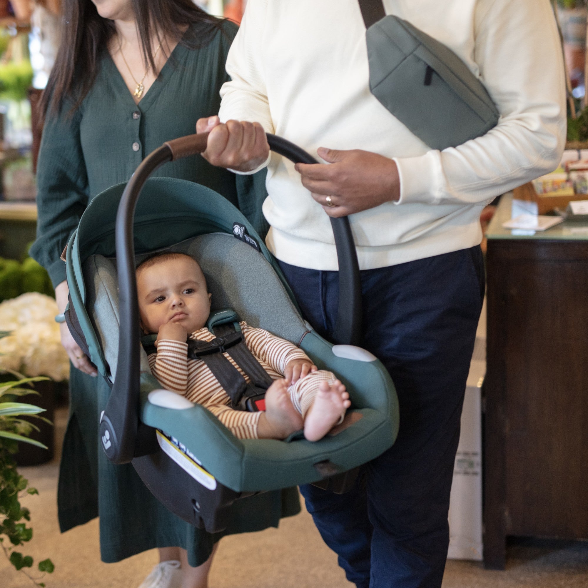 Mico™ Luxe+ Infant Car Seat - father carrying baby in car seat