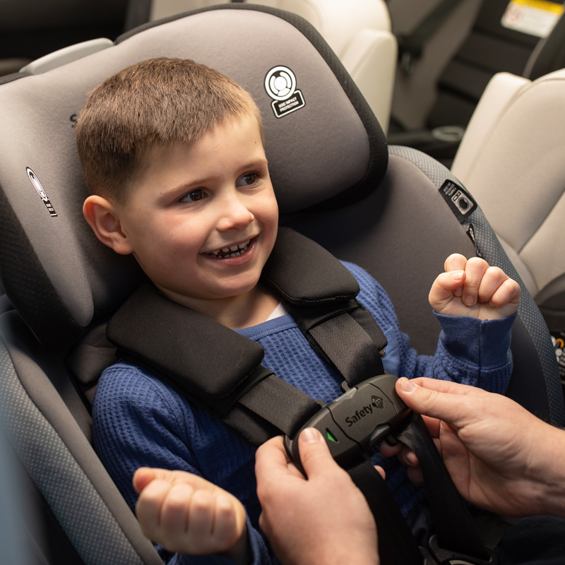 child in rotating car seat