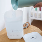 Comforting Cool Mist Top-Fill Humidifier - refilling humidifier with water